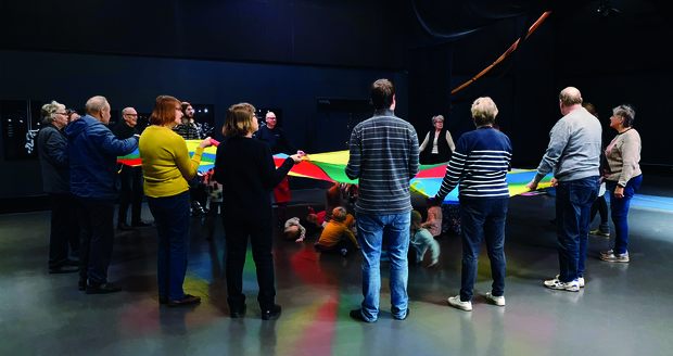 elderly people and children performing circus acts